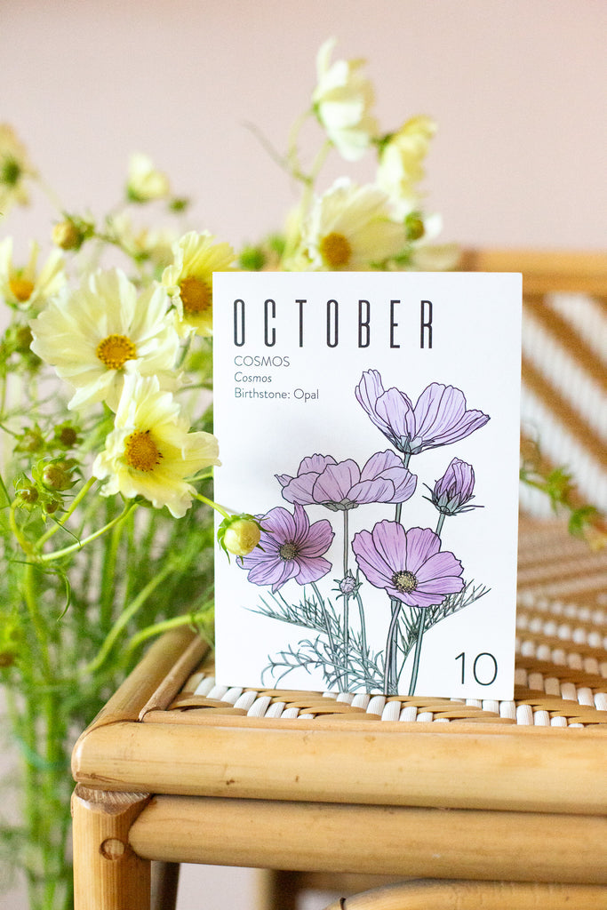 Floral-themed calendar for October on a white background with flowers in the background.