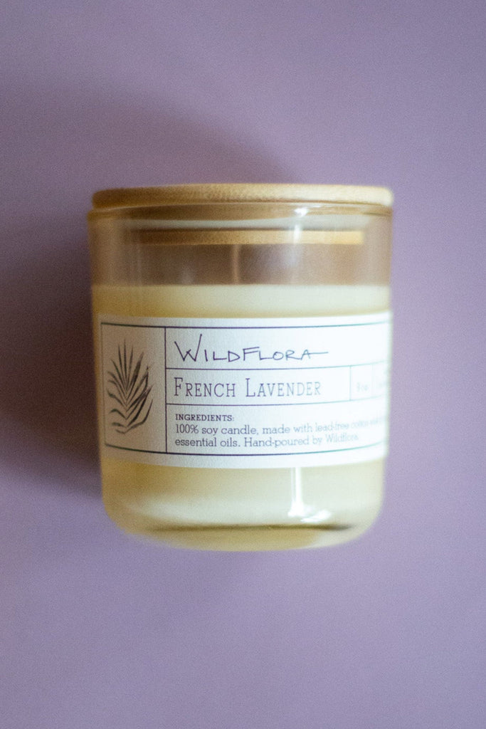 WildFlora French Lavender Candle jar  on a purple background